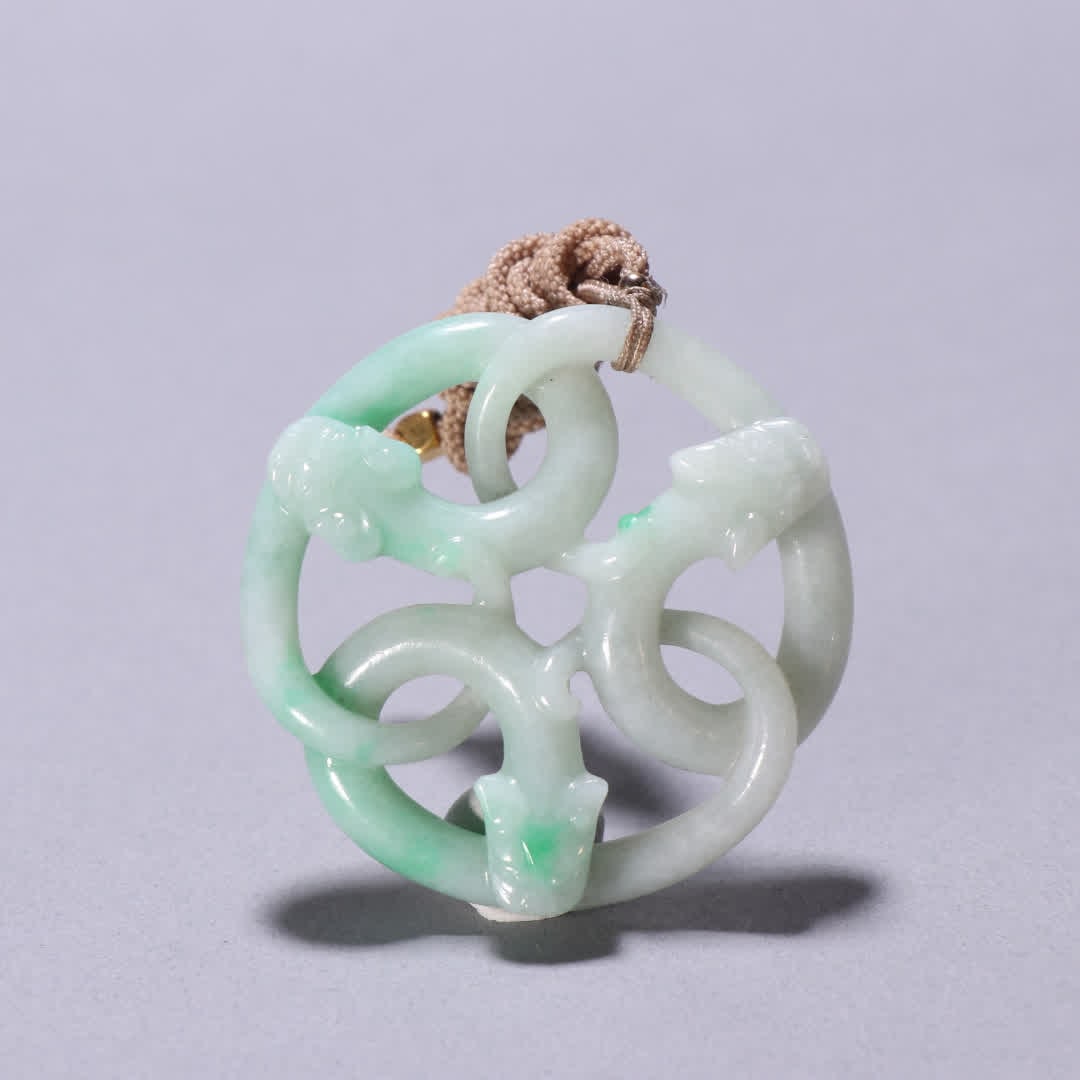 A Qing Dynasty jade dragon pendant: Qing Dynasty jade dragon pendant SIZE: D:5.25cm T:1.2cm W:33.6g (The Dimensions Of All Batches Are Manually Measured.If You Need More Detailed Information, Please Contact Our Customer Service Before B