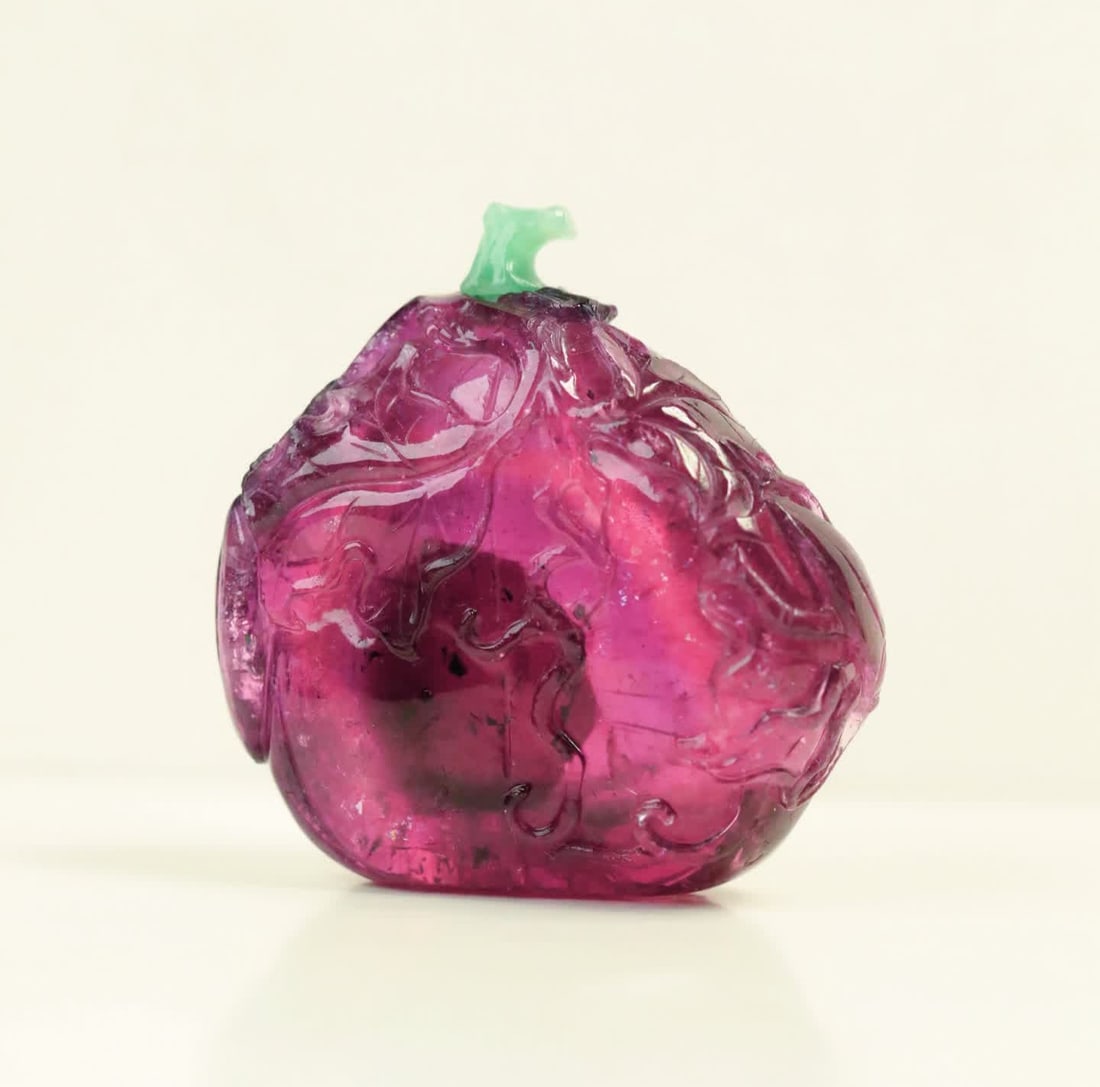 A Qing Dynasty rubellite melon fruit snuff bottle with jade snuff bottle cap (1 of 6)