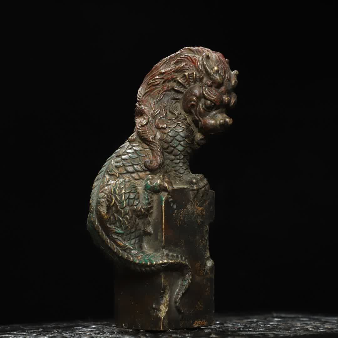 A Ming Dynasty copper absorbing beast ornament: Ming Dynasty copper water-absorbing beast ornament SIZE: H:20cm W:8.6cm T:6cm W:1.33kg (The Dimensions Of All Batches Are Manually Measured.If You Need More Detailed Information, Please Contact Our Cu