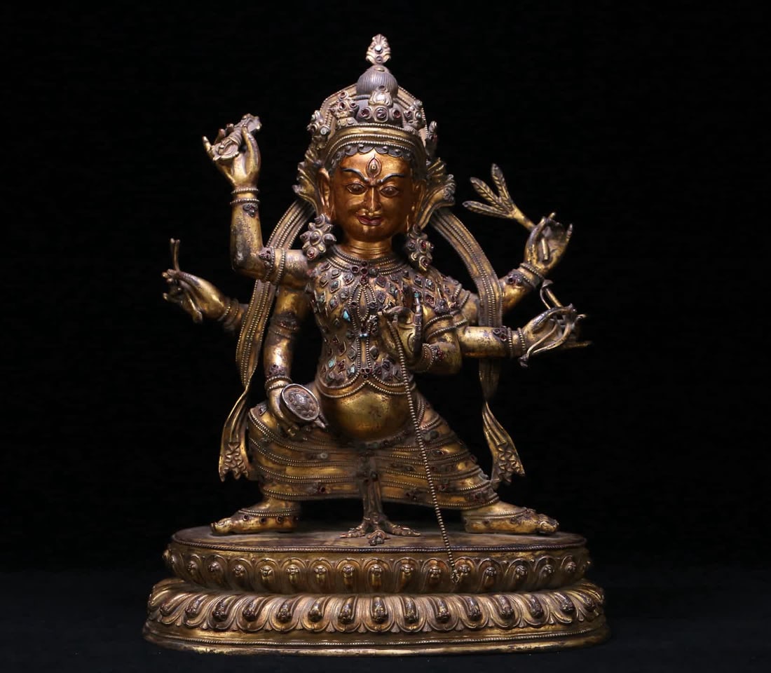 A 16th-century statue of the Buddha Mother in bronze gilt leaf robes at Dansati Temple: 16th century Dansati Temple Statue of the Buddha Mother in bronze gilt leaf clothes SIZE: 44x33x16cm W:9675g (The Dimensions Of All Batches Are Manually Measured.If You Need More Detailed