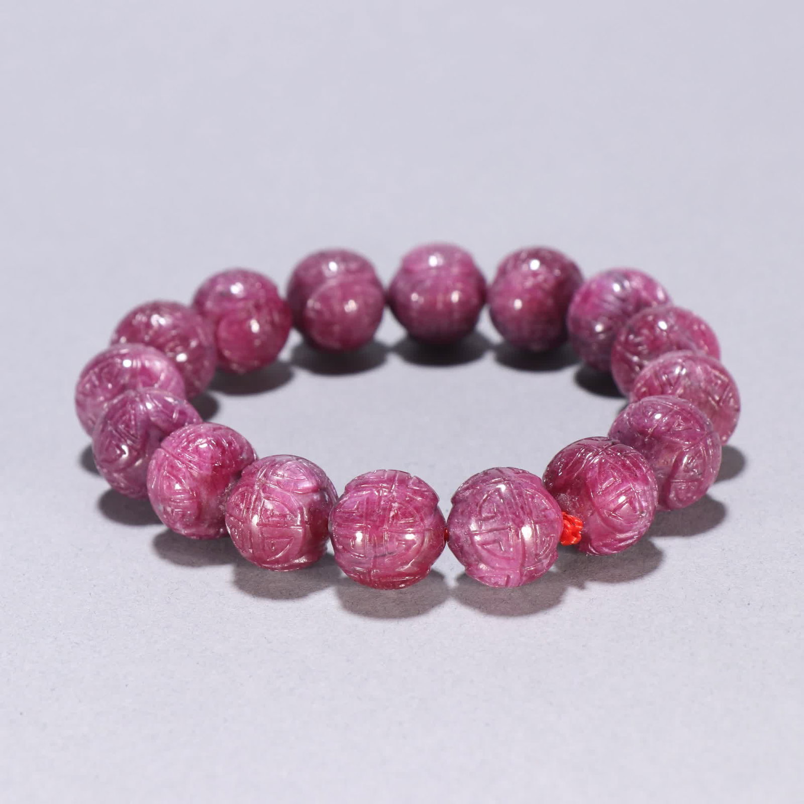 A Qing Dynasty ruby carved longevity pattern bracelet - 3