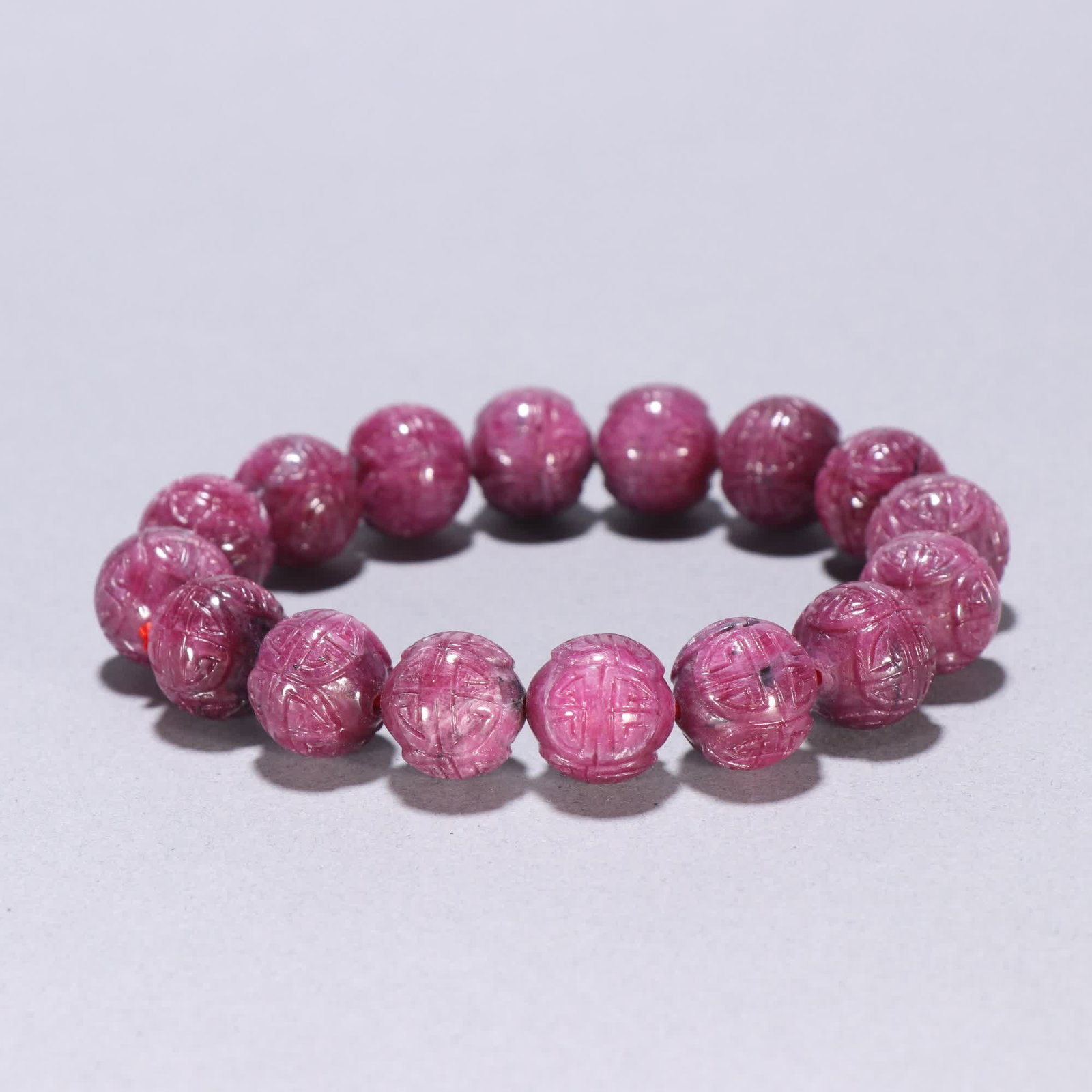 A Qing Dynasty ruby carved longevity pattern bracelet - 5