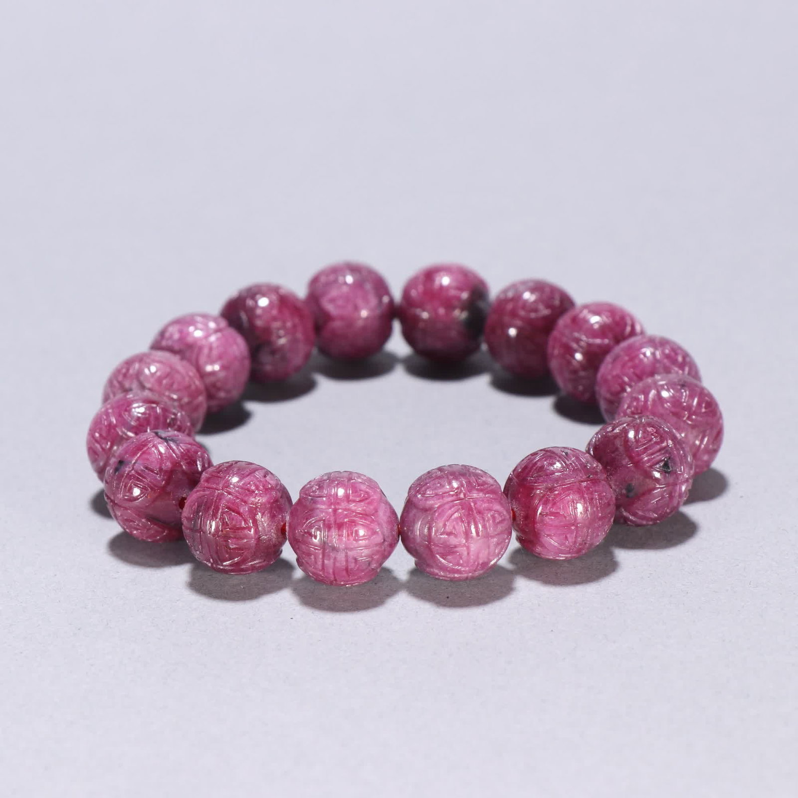 A Qing Dynasty ruby carved longevity pattern bracelet - 8