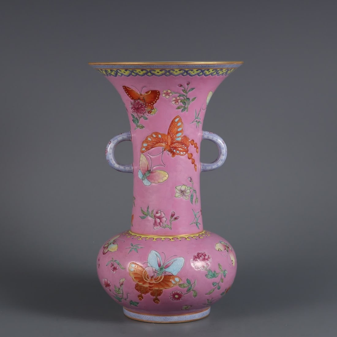 A Qing Dynasty Qianlong year made rouge powder ground pastel butterfly love pattern amphora flower: Qing Dynasty Qianlong year rouge powder ground pastel butterfly love pattern amphora flower arrangement SIZE: H: 25.5cm MouthD: 15.2cm Belly diameter 14cm (The Dimensions Of All Batches Are Manually M