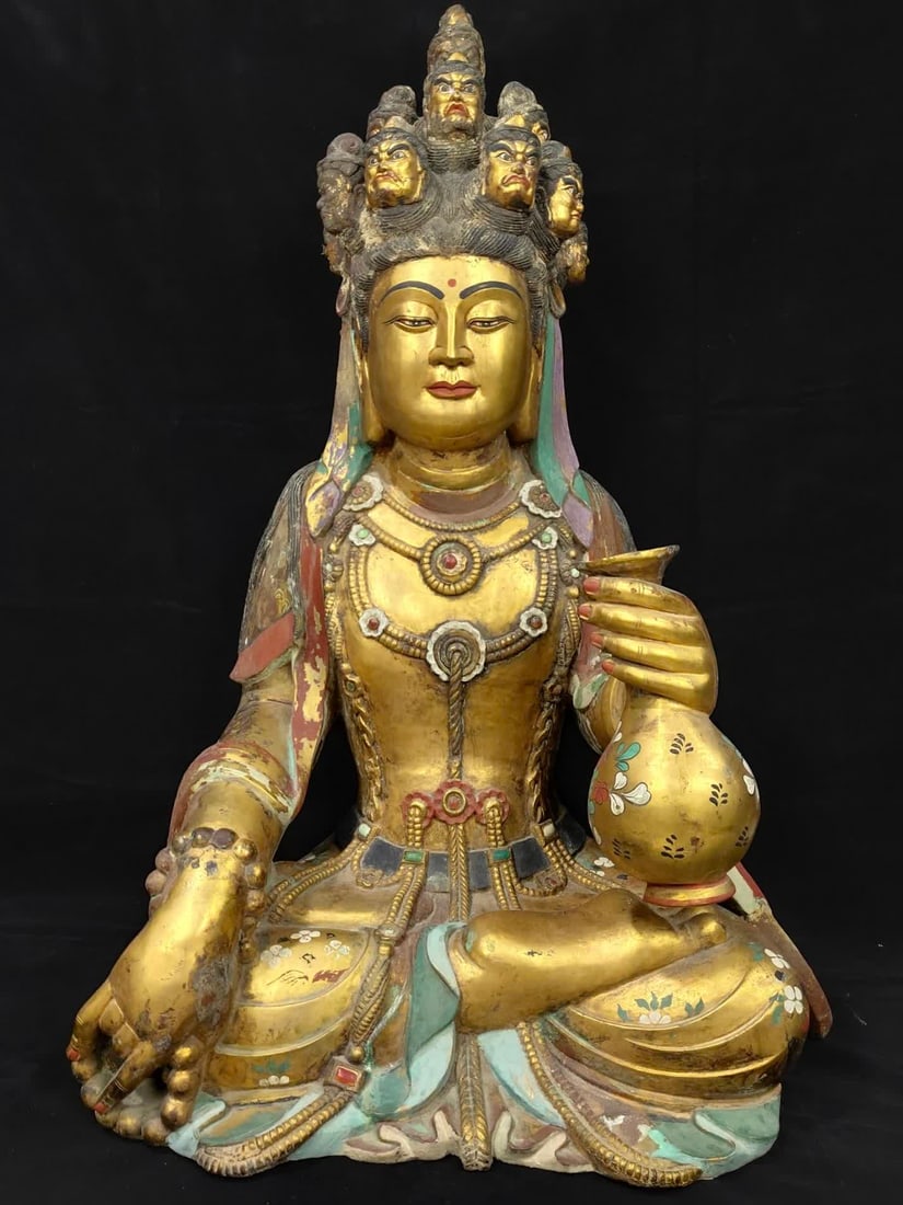 A Tang Dynasty bronze painted gilt multi-headed Buddha: Tang Dynasty purple copper painted gilt multi-headed Buddha SIZE: H:78cm W:54cm W:39kg (The Dimensions Of All Batches Are Manually Measured.If You Need More Detailed Information, Please Contact Our Cu