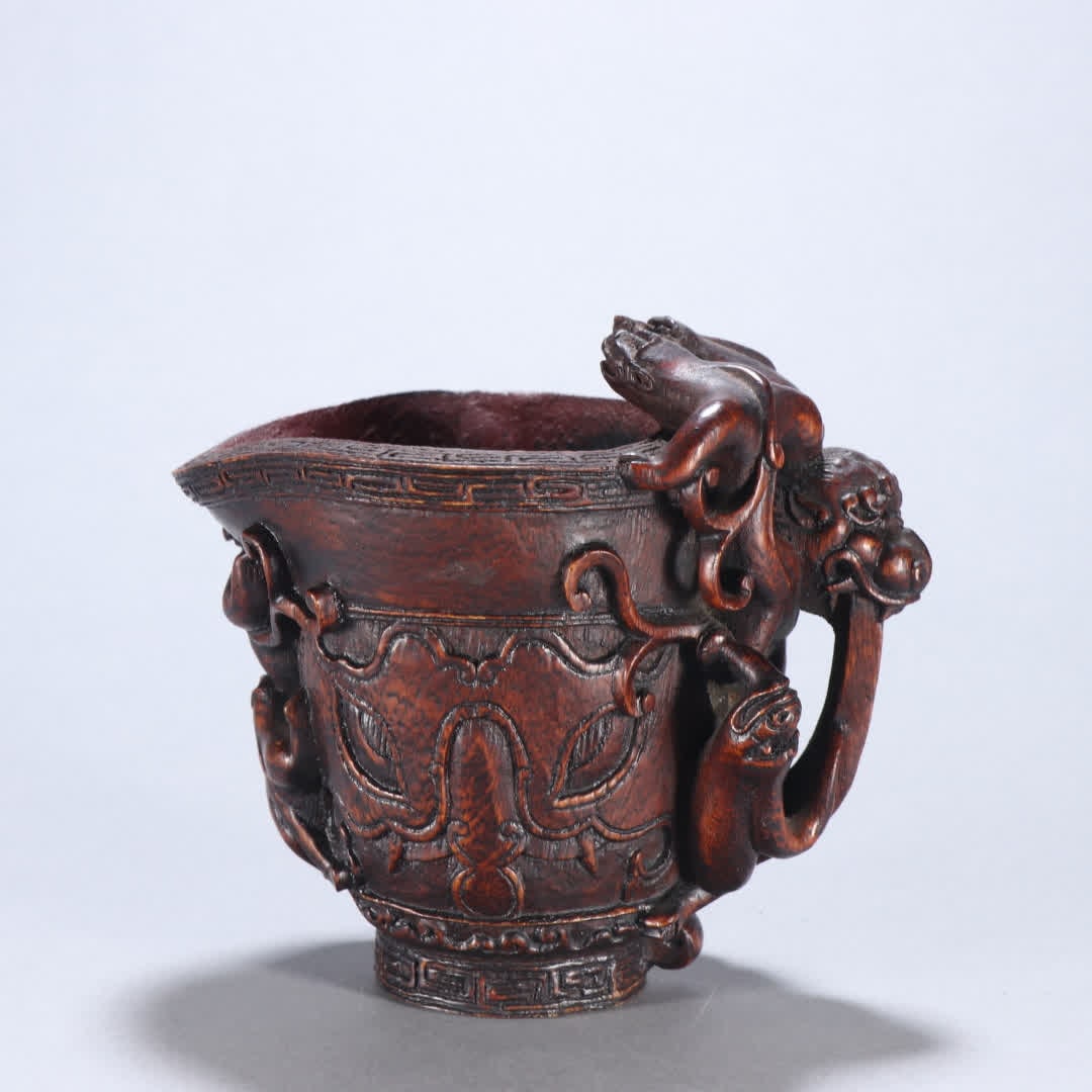 A Qing Dynasty agarwood dragon pattern cup: Qing Dynasty agarwood dragon pattern cup SIZE: H:11.2cm W:12cm W:82.3g (The Dimensions Of All Batches Are Manually Measured.If You Need More Detailed Information, Please Contact Our Customer Service B