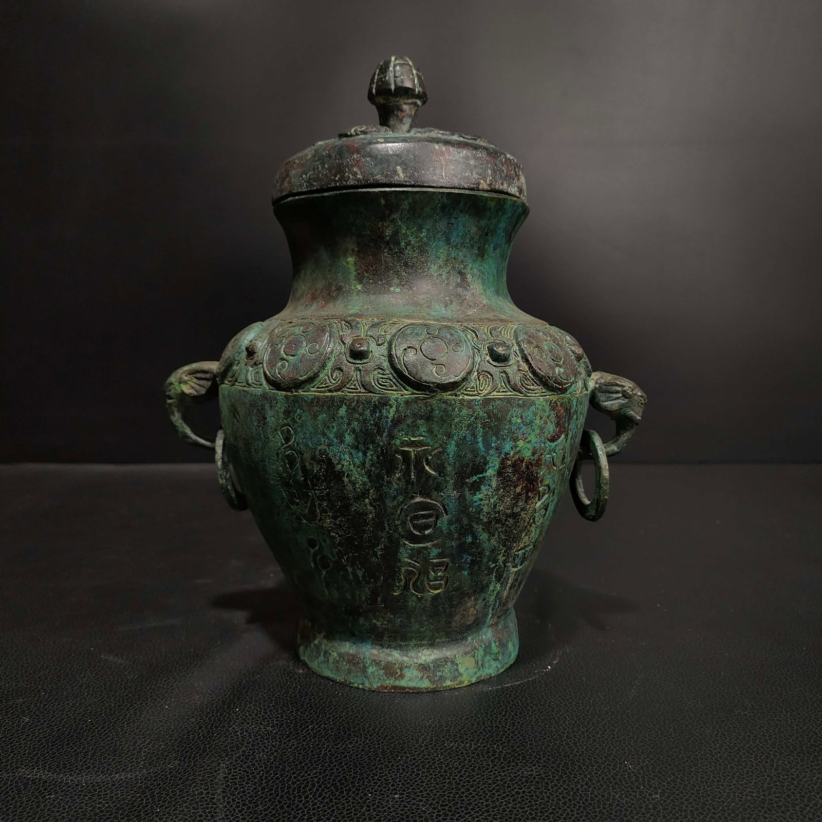 A Shang bronze elephant head ring with a lid inscription pot: Shang bronze elephant head with ring lid inscription pot SIZE: L:20cm W:9cm H:25cm W:2kg (The Dimensions Of All Batches Are Manually Measured.If You Need More Detailed Information, Please Contact Our 