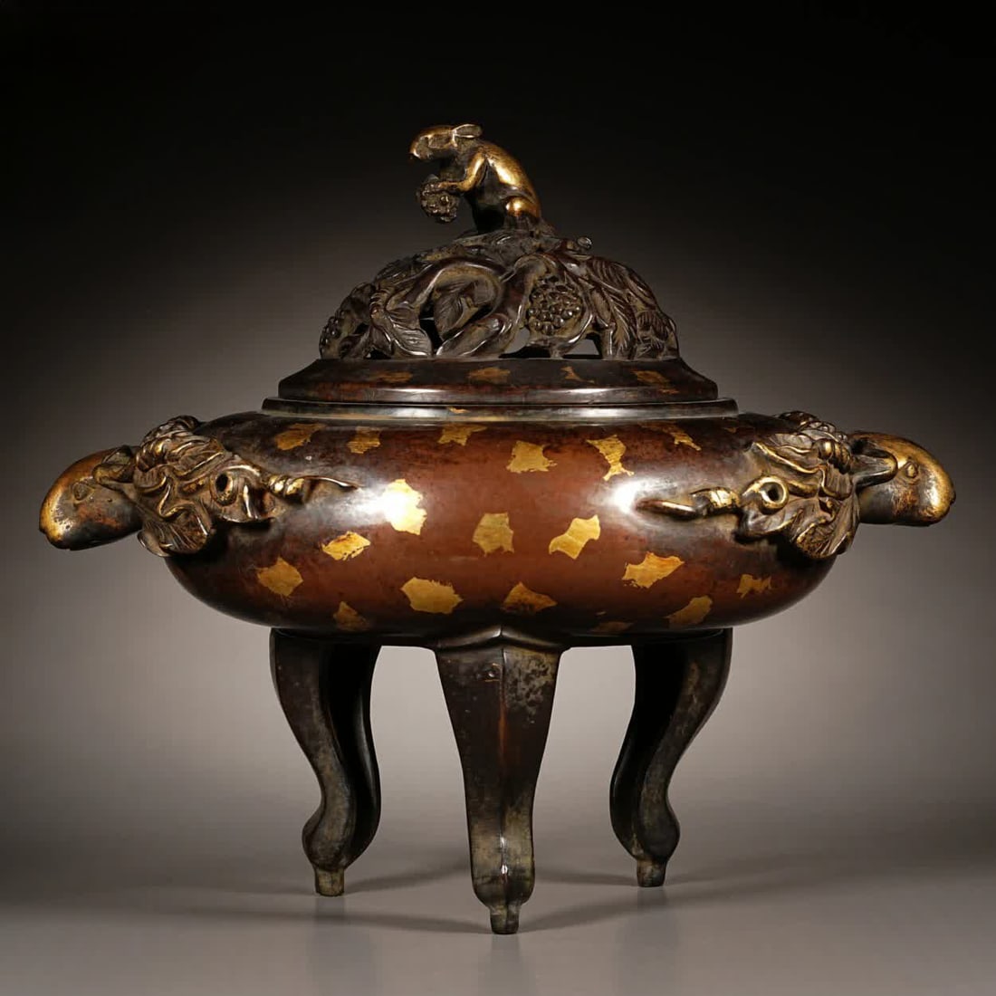 A Qing Dynasty copper squirrel grape incense stove (1 of 9)