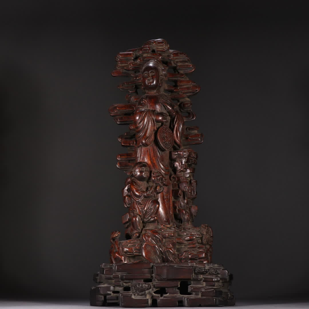 A statue of Guanyin in the Qing Dynasty: Qing Dynasty agarwood Guanyin boy statue SIZE: H:37cm W:18cm W:770g (The Dimensions Of All Batches Are Manually Measured.If You Need More Detailed Information, Please Contact Our Customer Service Befo