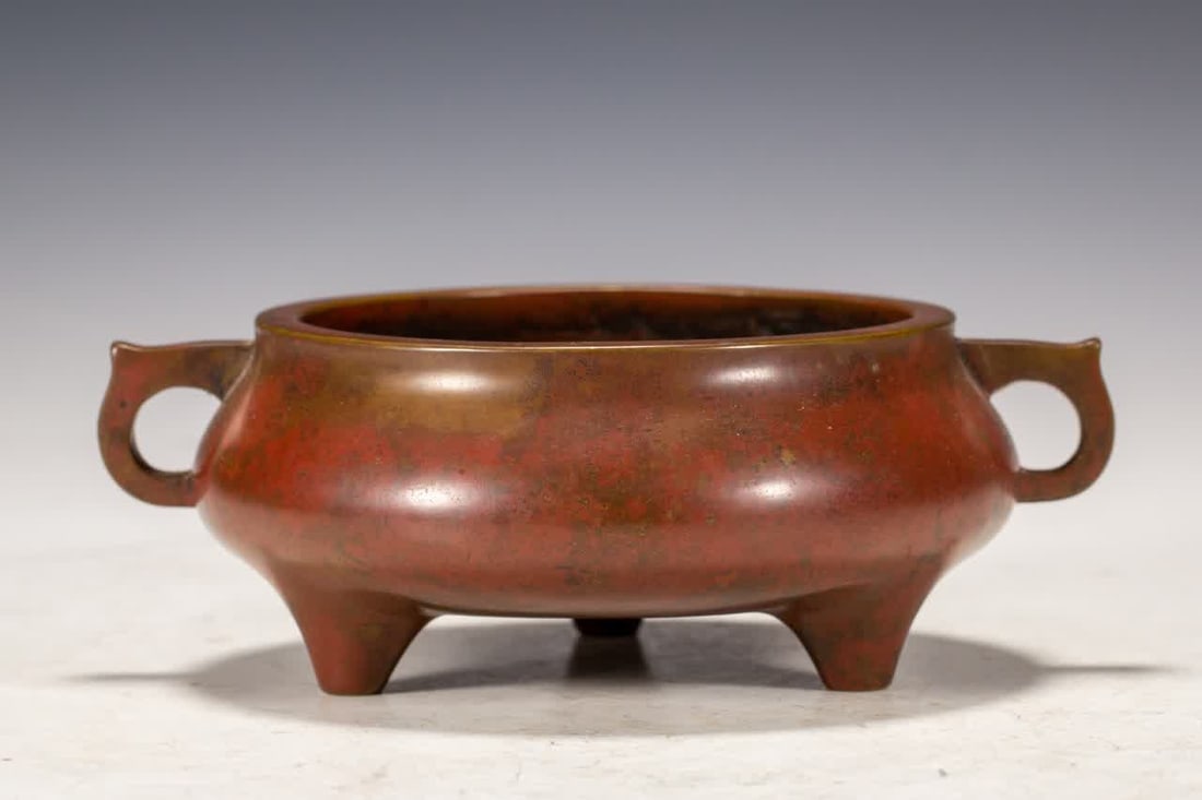 A Qing Dynasty copper three-legged amphora (1 of 8)