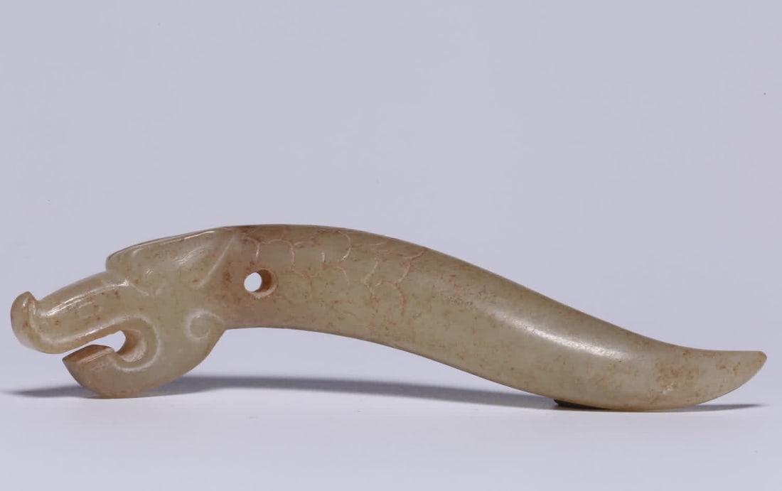 A Qing Dynasty Hetian jade seed material with Qinlong-shaped jade: Qing Dynasty Hetian jade seed material with Qinlong-shaped jade beak SIZE: L:7.8cm W:15.3g (The Dimensions Of All Batches Are Manually Measured.If You Need More Detailed Information, Please Contact Ou