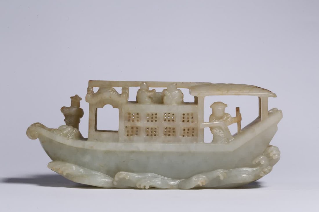 A Qing Dynasty Hetian white jade high official boat ornament (1 of 9)