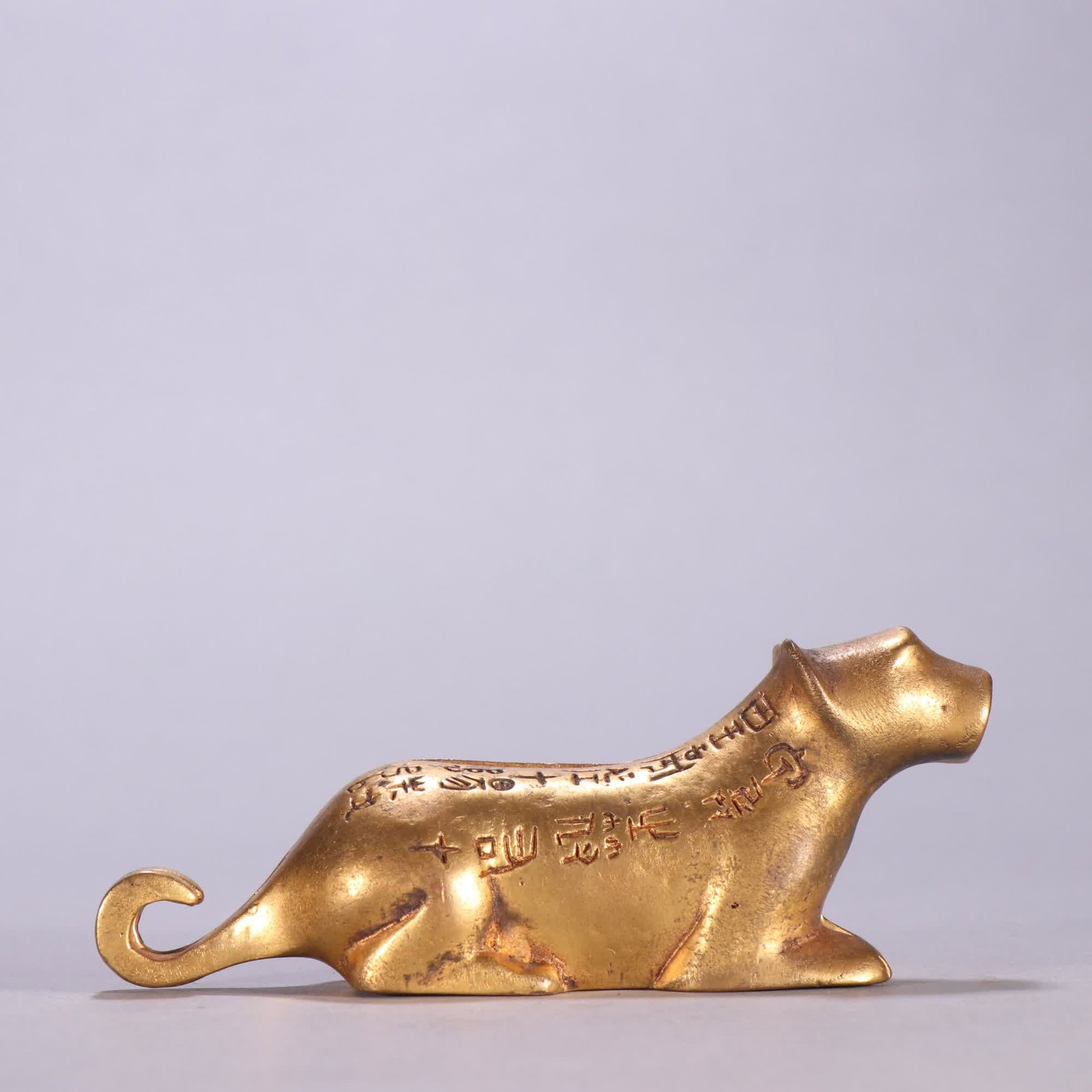 A Qing Dynasty copper gilt tiger talisman: Qing Dynasty copper gilt tiger talisman SIZE: L:11.2cm H:4.35cm W:430g (The Dimensions Of All Batches Are Manually Measured.If You Need More Detailed Information, Please Contact Our Customer Service B