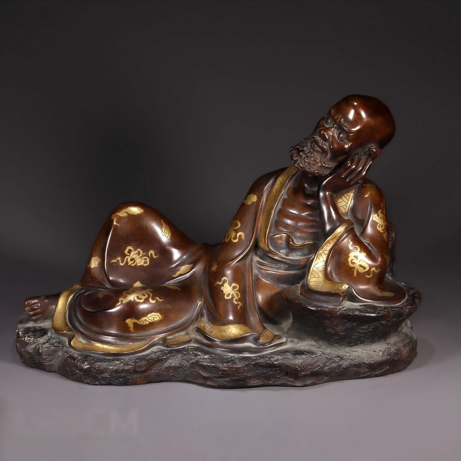 A piece of Qing Dynasty bronze reclining Buddha Dharma: Qing Dynasty Purple Bronze Reclining Buddha Dharma SIZE: L:50cm H:30cm W:12.5kg (The Dimensions Of All Batches Are Manually Measured.If You Need More Detailed Information, Please Contact Our Customer 