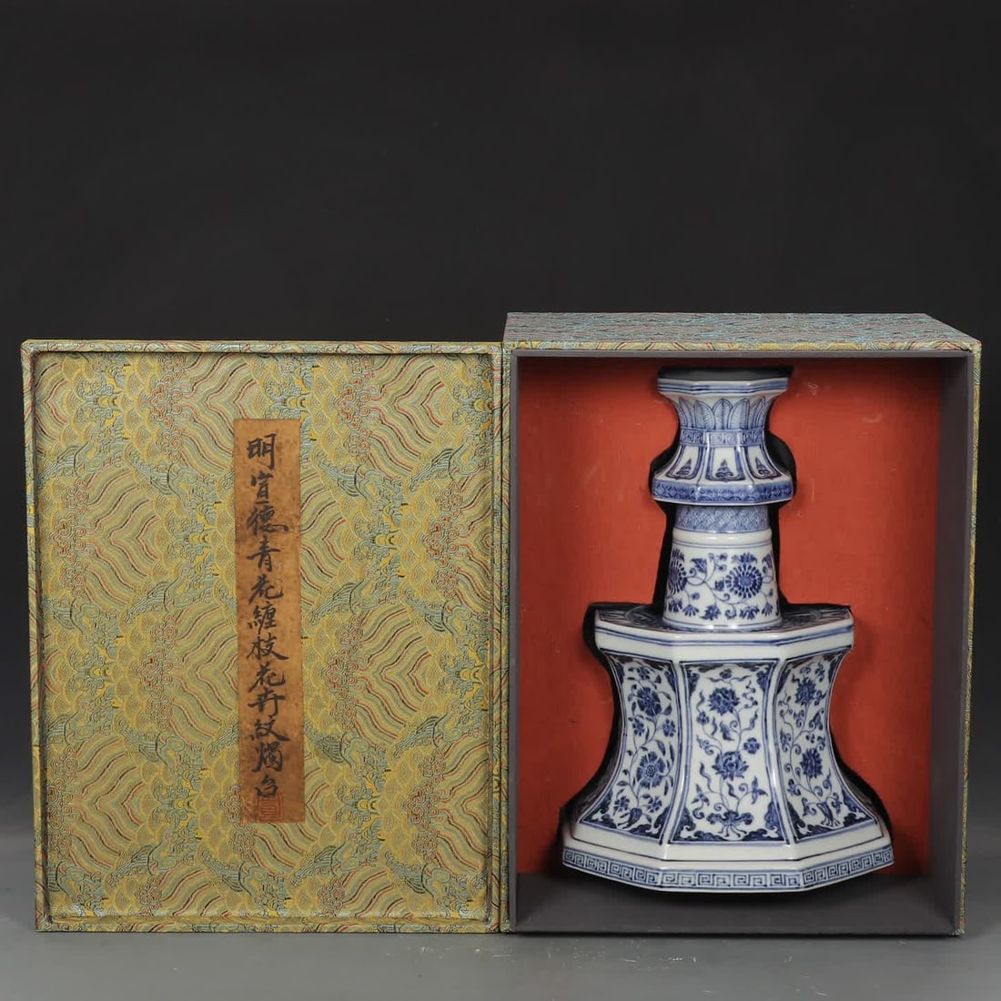 A Ming Dynasty Yongle blue and white entwined flower pattern candlestick: Ming Dynasty Yongle blue and white entwined flower pattern candlestick SIZE: H:35.5cm MouthD:9.8cm D:24.5cm (The Dimensions Of All Batches Are Manually Measured.If You Need More Detailed Information, 