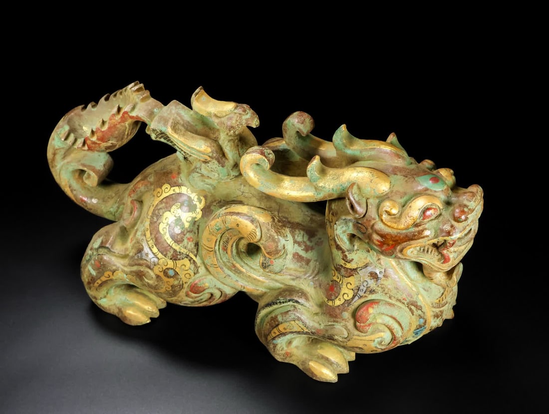 A Han Dynasty jade painted beast: Han Dynasty jade painted beast SIZE: L: 33cm W: 12.5cm H: 20.5cm Total W: 7920g (The Dimensions Of All Batches Are Manually Measured.If You Need More Detailed Information, Please Contact Our Customer 