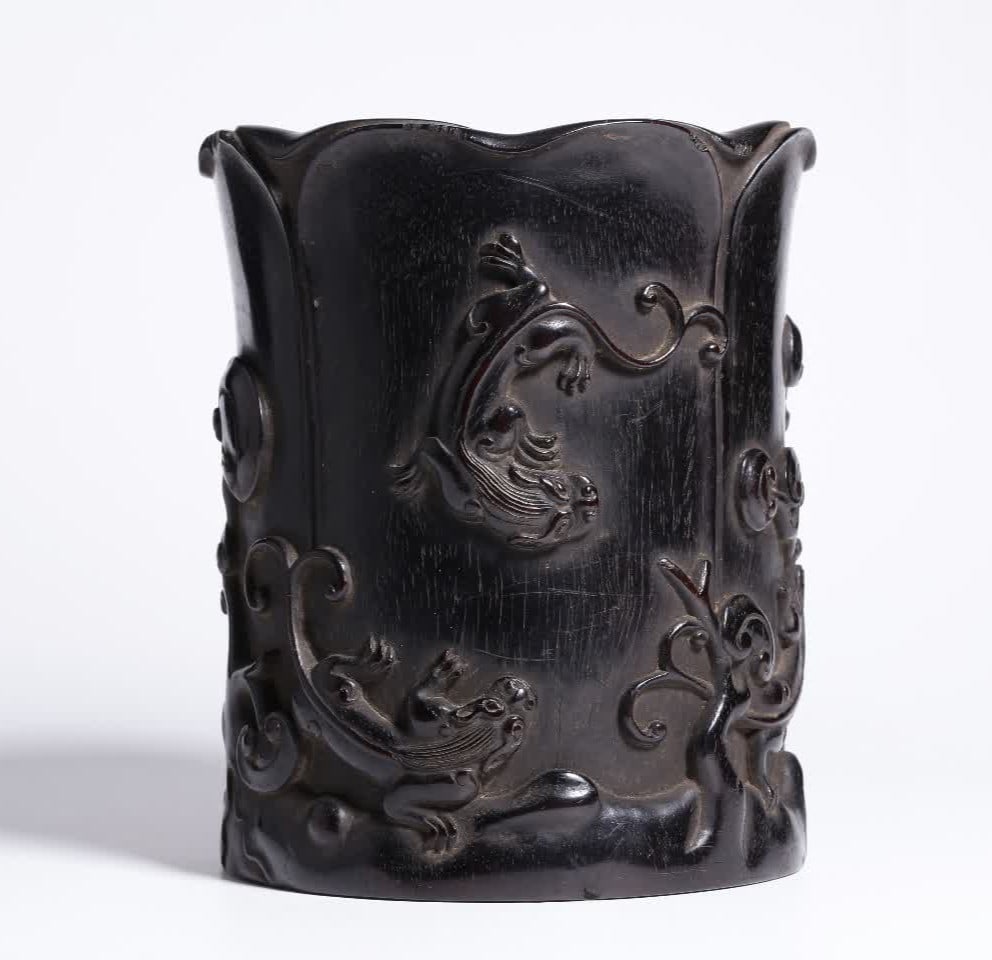 A Qing Dynasty small-leaved rosewood dragon holding a Zhi pen holder (1 of 8)
