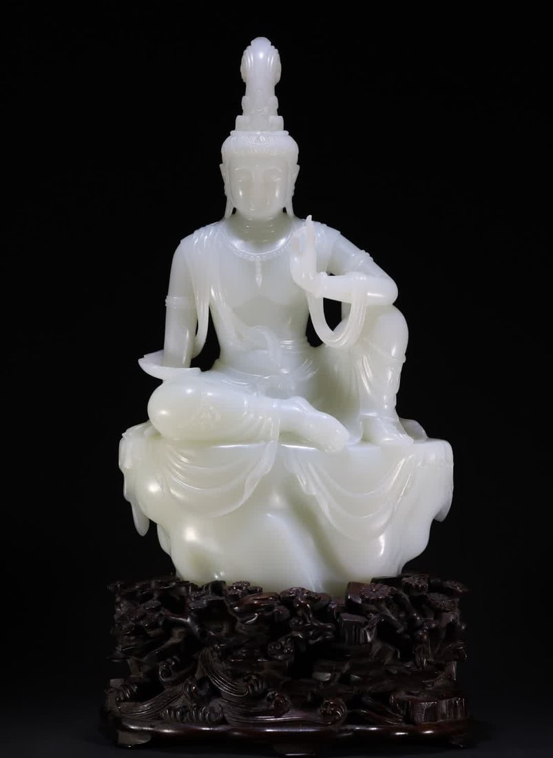 A Qing Dynasty mutton fat white jade free Guanyin seated statue (1 of 11)