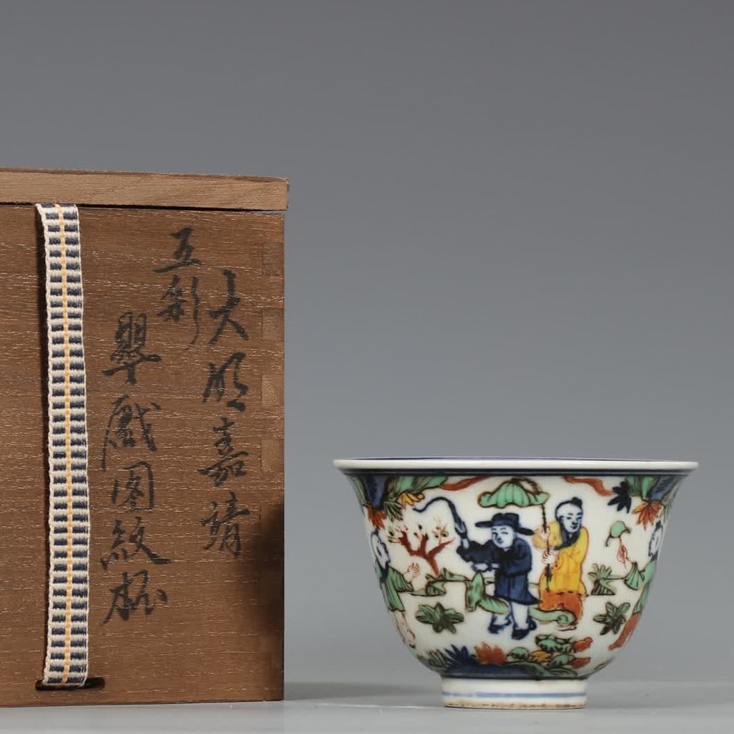 A Ming Dynasty Jiajing colorful baby play pattern cup: Ming Dynasty Jiajing colorful baby play pattern cup SIZE: H:6.2cm MouthD:9.2cm (The Dimensions Of All Batches Are Manually Measured.If You Need More Detailed Information, Please Contact Our Customer S
