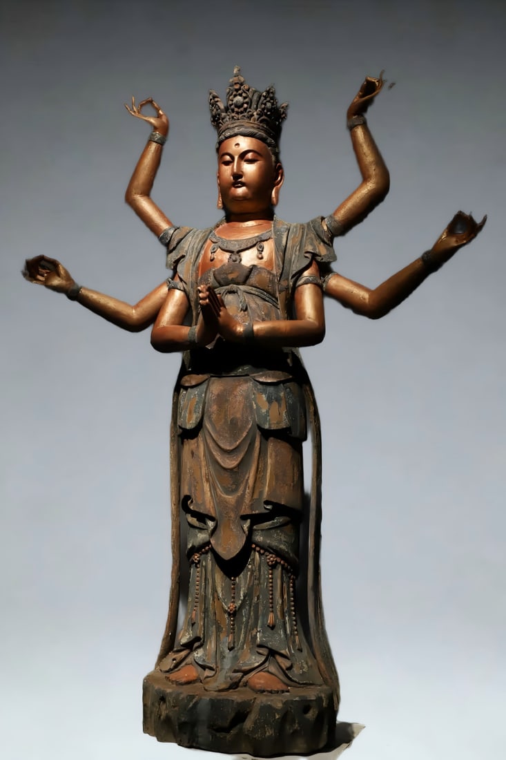 A Ming Dynasty wood carving eight-armed Guanyin station statue: Ming Dynasty wood carving eight-armed Guanyin station statue SIZE: H:130cm L:100cm W:40cm (The Dimensions Of All Batches Are Manually Measured.If You Need More Detailed Information, Please Contact
