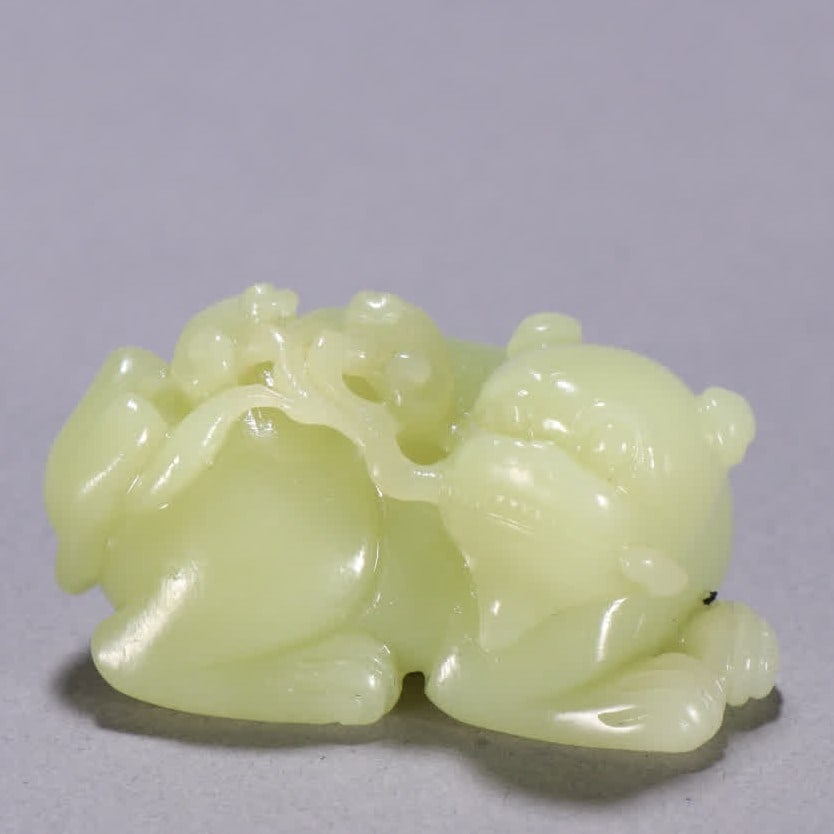 A Qing Dynasty Hetian topaz beast wishful ornament: Qing Dynasty Hetian topaz beast wishful ornament SIZE: H:2.7cm W:5.4cm W:66.5g (The Dimensions Of All Batches Are Manually Measured.If You Need More Detailed Information, Please Contact Our Customer