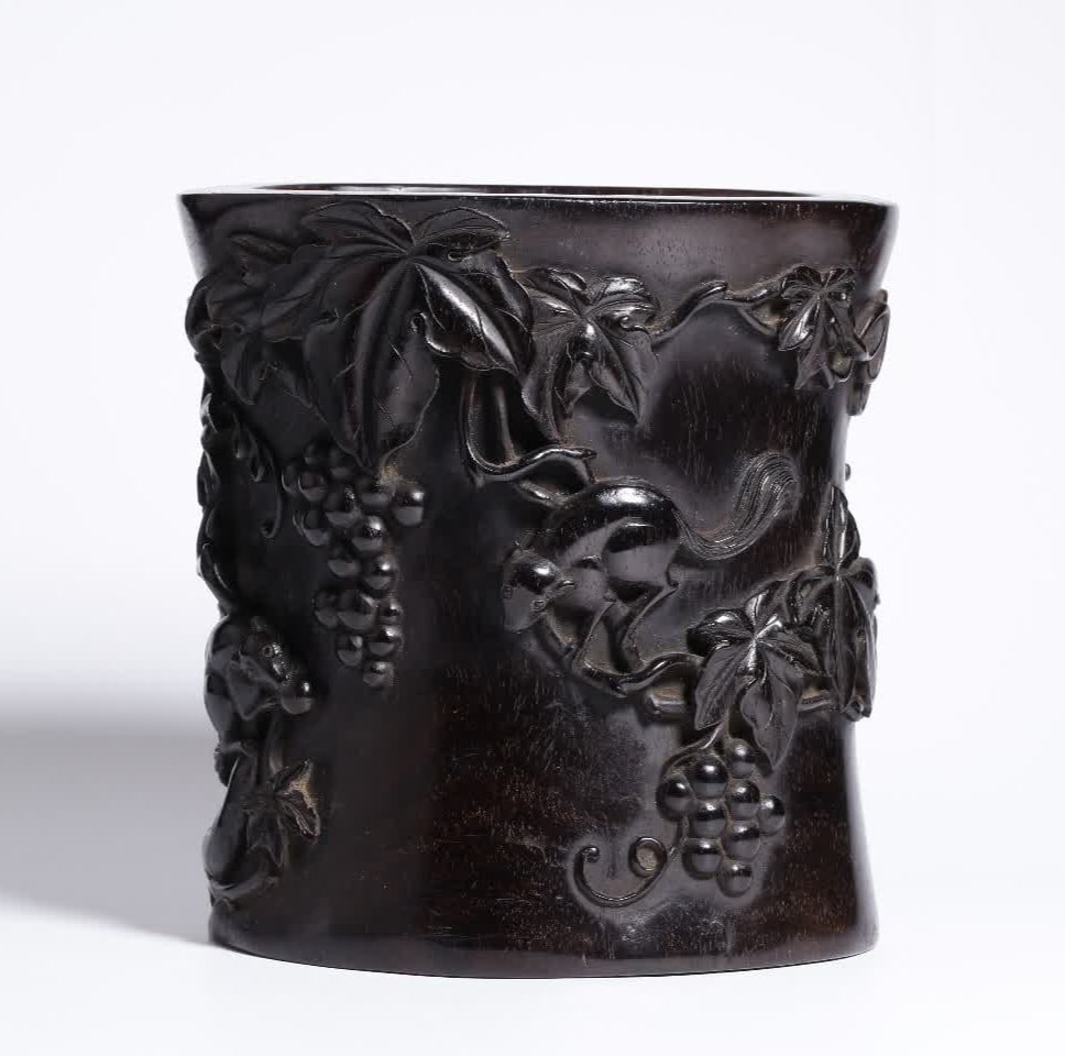 A Qing Dynasty small-leaved rosewood multi-seed multi-blessing pen holder (1 of 9)