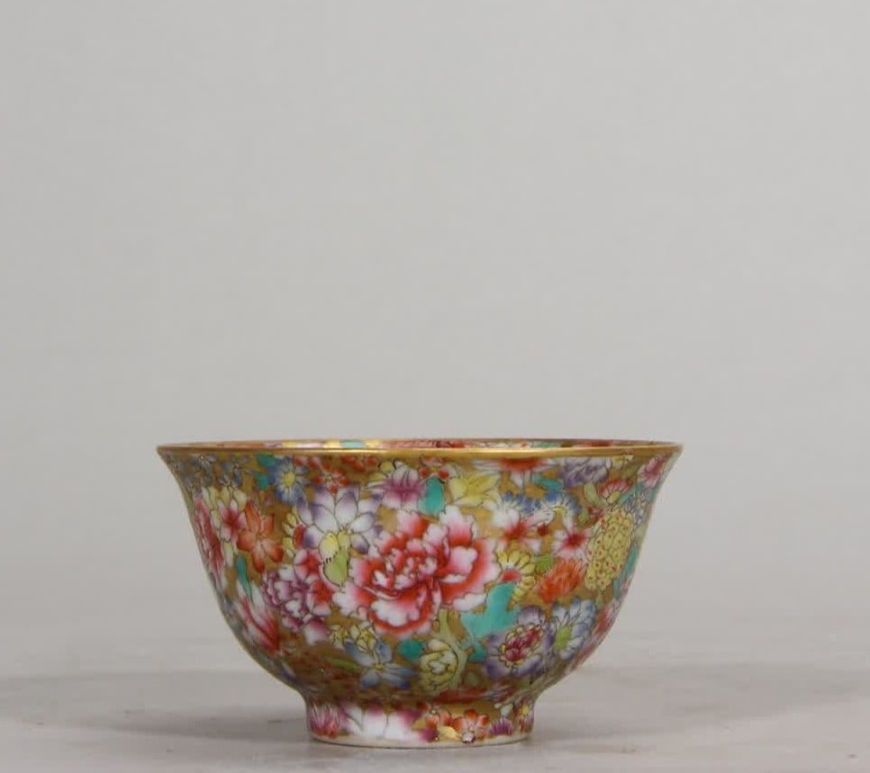 A Qing Dynasty Yongzheng gold ground kaleidoscope tea circle: Qing Dynasty Yongzheng Golden Di Kaleidoscope Tea Circle SIZE: H:3.5cm D:6.4cm (The Dimensions Of All Batches Are Manually Measured.If You Need More Detailed Information, Please Contact Our Customer S