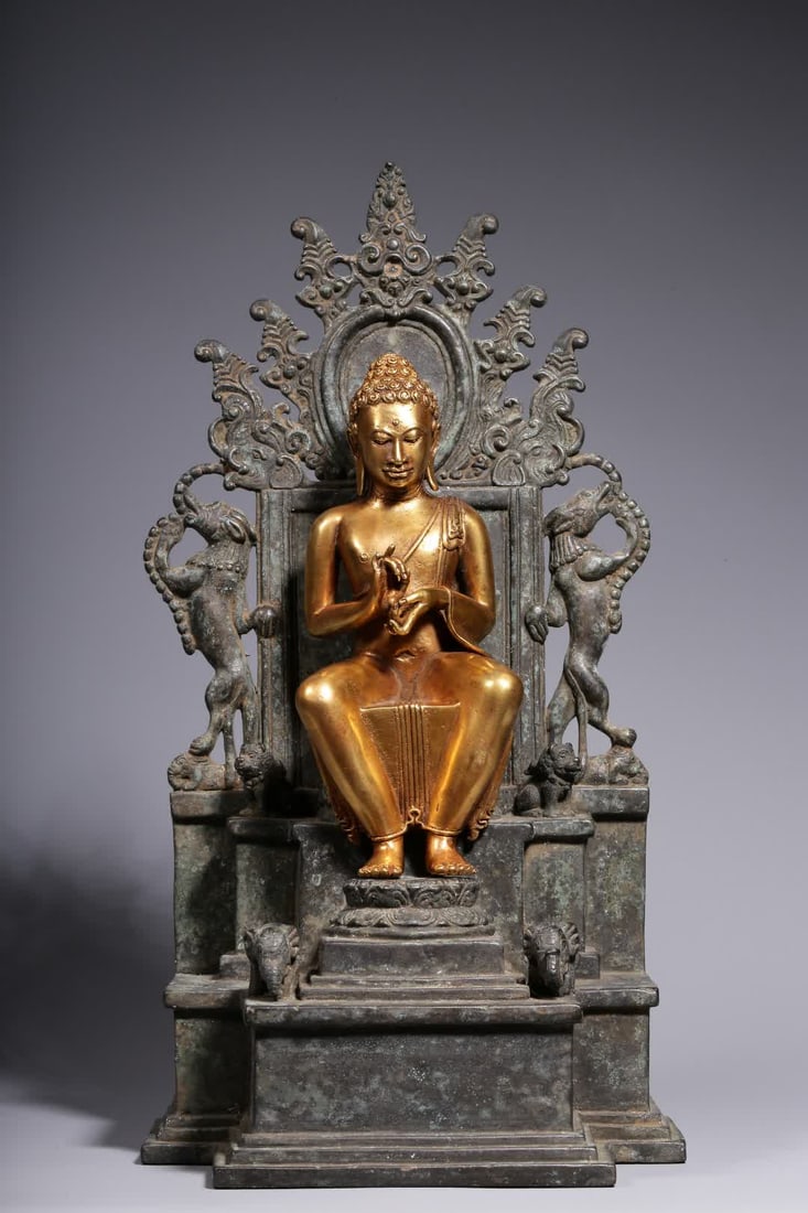 A bronze seated statue of Shakyamuni in the Qing Dynasty: Bronze seated statue of Shakyamuni in Java SIZE: H:33cm (The Dimensions Of All Batches Are Manually Measured.If You Need More Detailed Information, Please Contact Our Customer Service Before Bidding.)