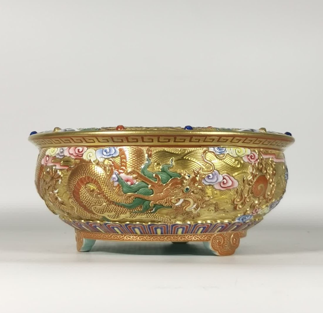 A Qing Dynasty Qianlong enamel colored gold carved double dragon pearl incense burner: Qing Dynasty Qianlong enamel colored gold ground carved double dragon playing bead incense burner SIZE: H:9cm MouthD:21cm Foot diameter 13.3cm (The Dimensions Of All Batches Are Manually Measured.If Y