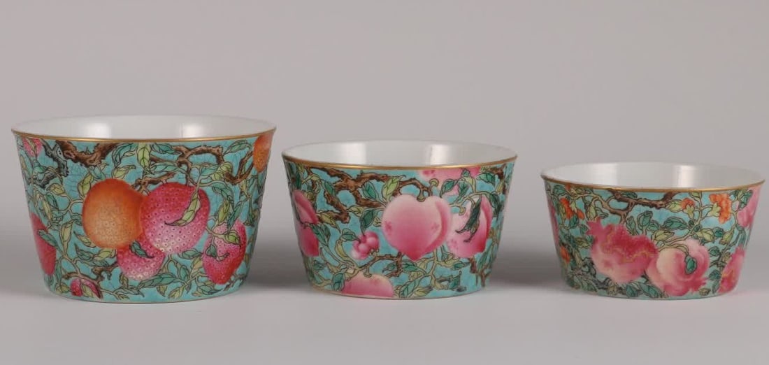 A set of Qing Dynasty Yongzheng year turquoise green enamel color three multi-patterned jar cups (1 of 9)