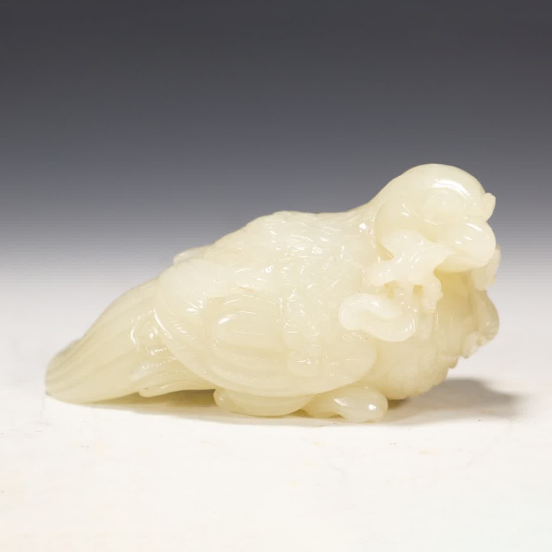 A Qing Dynasty Hetian jade sea Dongqing ornament: Qing Dynasty Hetian Yuhai Dongqing ornament SIZE: L:9.5cm W:4cm H:5cm W:210g (The Dimensions Of All Batches Are Manually Measured.If You Need More Detailed Information, Please Contact Our Customer Ser