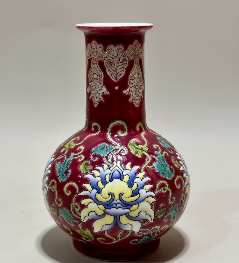 A Qing Dynasty Kangxi imperial enamel purple passionflower pattern flat-mouth celestial ball vase: Qing Dynasty Kangxi imperial enamel purple background passionflower pattern flat mouth celestial ball vase SIZE: H: 14cm MouthD: 4.8cm Bottom diameter 5.5cm (The Dimensions Of All Batches Are Manually