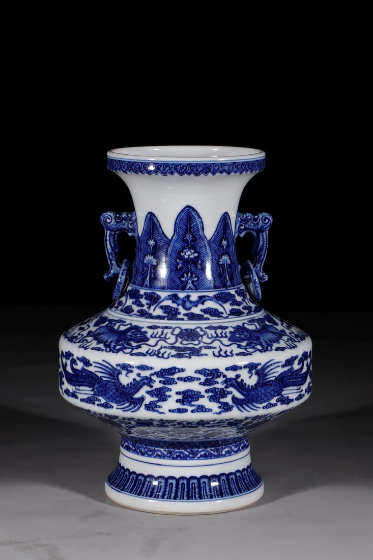 An Exquisite Blue and White Auspicious Beast Pattern Double-Ears Vase: An Exquisite Blue and White Auspicious Beast Pattern Double-Ears Vase Qing Dynasty, China Qianlong Six-character Mark Size:36cm (The Dimensions Of All Batches Are Manually Measured.If You Need More