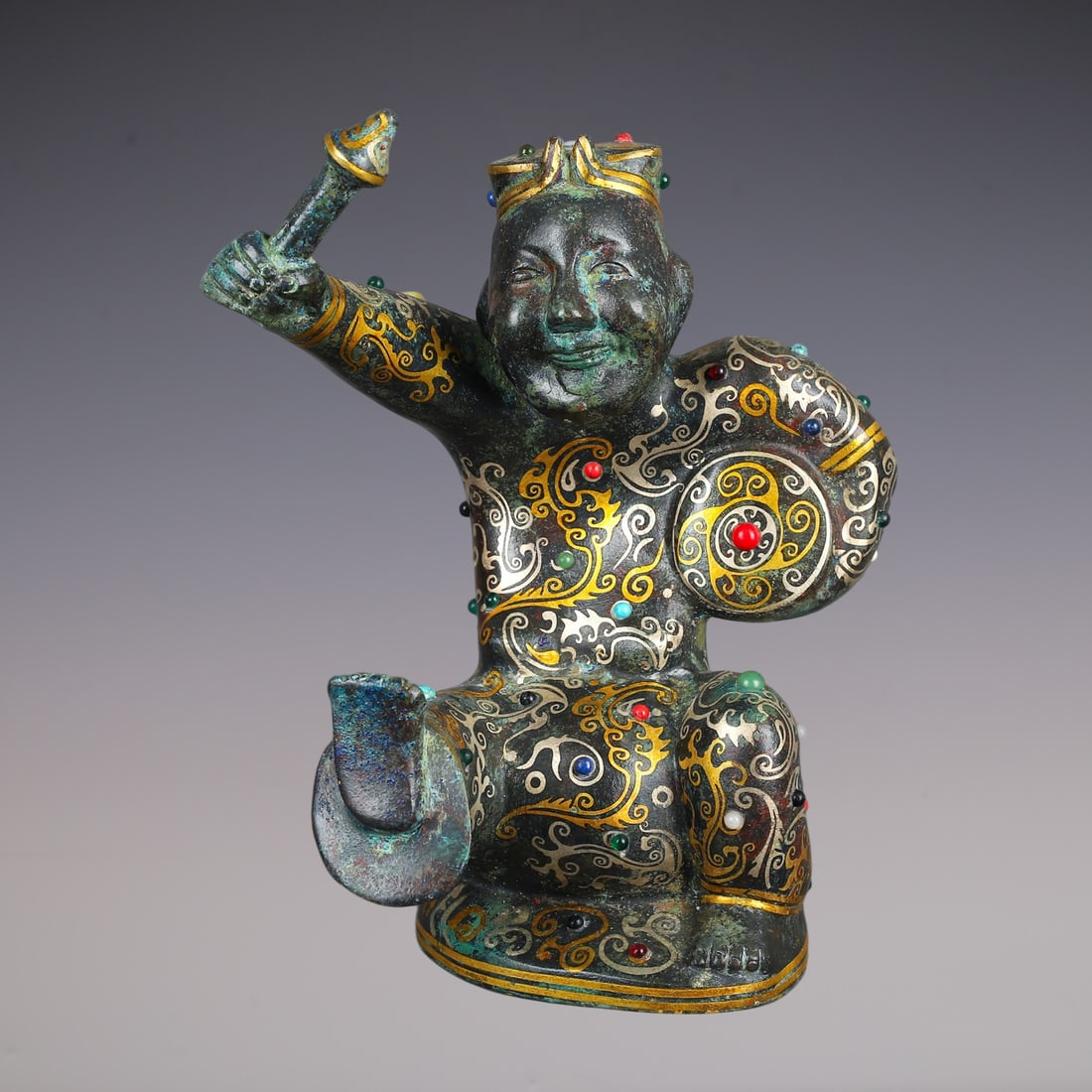 An Exquisite Bronze Inlaid Gold Inlaid Gems Figure Ornament: An Exquisite Bronze Inlaid Gold Inlaid Gems Figure Ornament Han Dynasty, China Size:18cmx18cmx24cm Weight:1860g (The Dimensions Of All Batches Are Manually Measured.If You Need More Detailed Informati