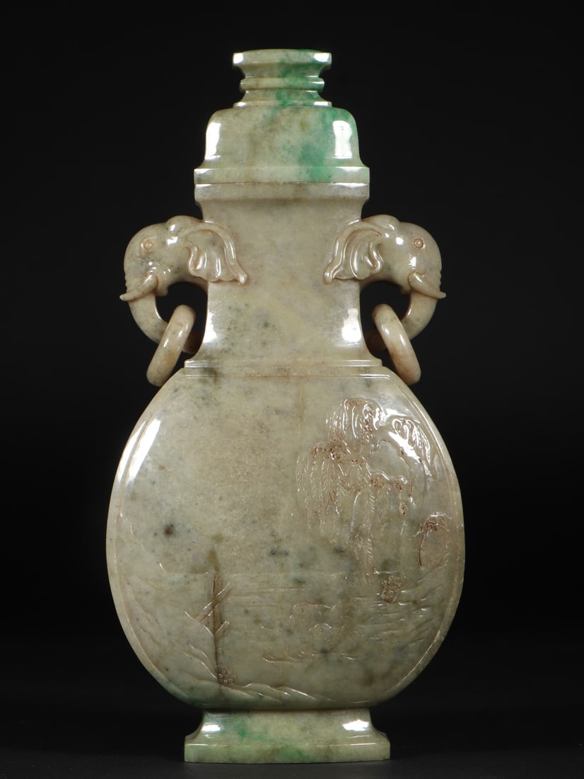 An Exquisite Jadeite Character and Story Pattern Double-Ears Vase: An Exquisite Jadeite Character and Story Pattern Double-Ears Vase Qing Dynasty, China Size:11.6cmx5.4cmx23cm Weight:1143g (The Dimensions Of All Batches Are Manually Measured.If You Need More Detailed