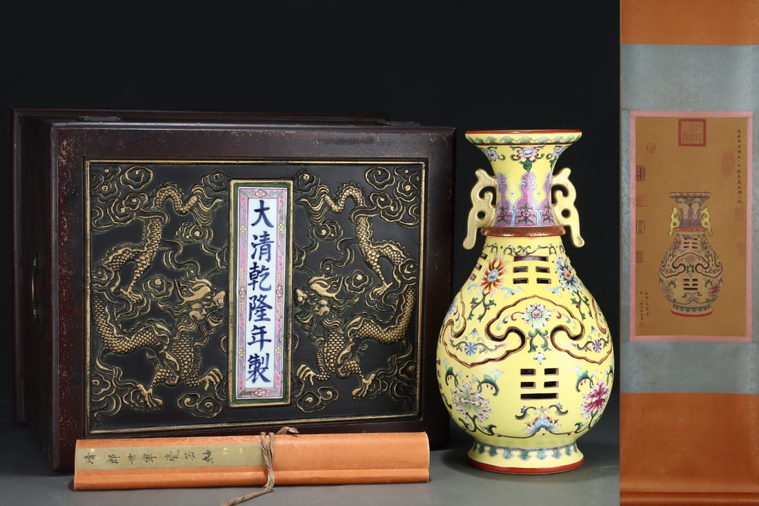 An Exquisite Enamel Lotus Pattern Double-Ears Vase: An Exquisite Enamel Lotus Pattern Double-Ears Vase Qing Dynasty, China Qianlong Six-character Mark Size:40.5cmx21.5cm Without frame Size:61cmx30cm (The Dimensions Of All Batches Are Manually Measured.