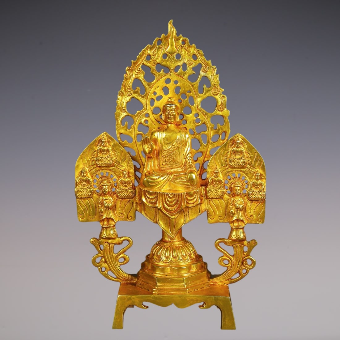 An Exquisite Gilt Bronze Buddha Statue: An Exquisite Gilt Bronze Buddha Statue N.Wei , China Size:21cmx33cm Weight:1950g (The Dimensions Of All Batches Are Manually Measured.If You Need More Detailed Information, Please Contact Our Customer