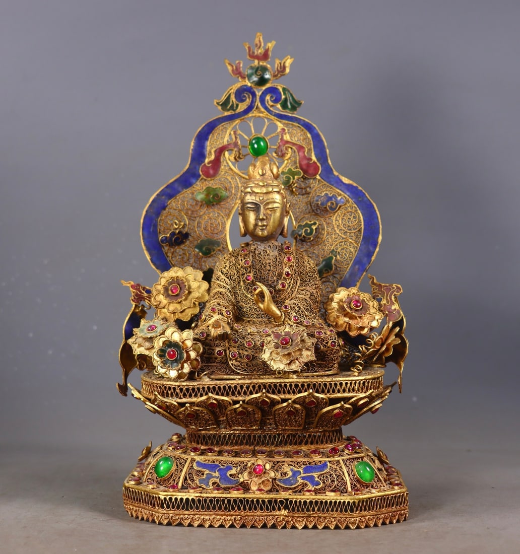 An Exquisite Gilt Bronze Inlaid Gems Buddha Statue: An Exquisite Gilt Bronze Inlaid Gems Buddha Statue Qing Dynasty, China Qianlong Four-character Mark Size:27.5cmx15cmx10.5cm Weight:765g (The Dimensions Of All Batches Are Manually Measured.If You Need