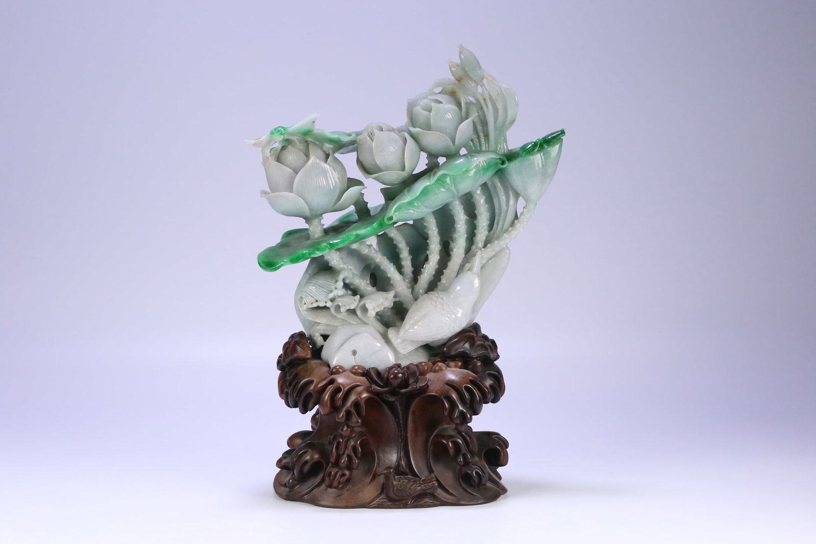 An Exquisite Jadeite Flower Pattern Rockery Ornament: An Exquisite Jadeite Flower Pattern Rockery Ornament Qing Dynasty, China Size:31cmx21cmx10cm Weight:2548.2g (The Dimensions Of All Batches Are Manually Measured.If You Need More Detailed Information, 