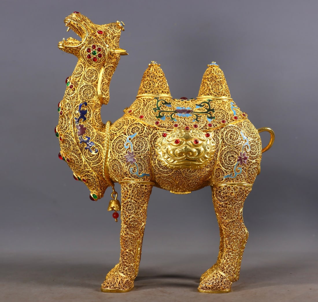 An Exquisite Gilt Bronze Inlaid Gems Camel: An Exquisite Gilt Bronze Inlaid Gems Camel Qing Dynasty, China Qianlong Four-character Mark Size:27.5cmx21cmx9cm Weight:903g (The Dimensions Of All Batches Are Manually Measured.If You Need More