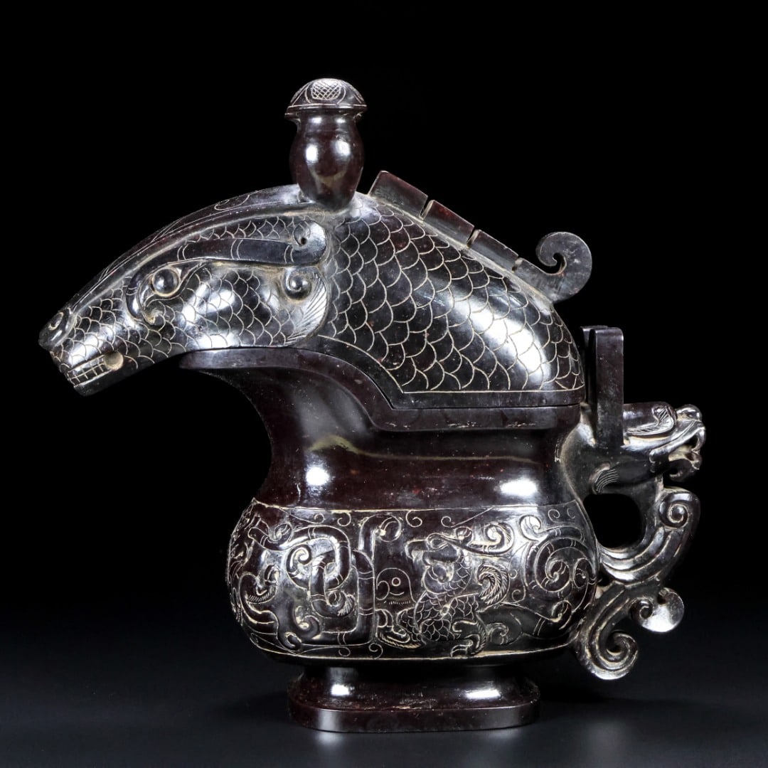 An Exquisite White Jade Phoenix Pattern Auspicious Beast-Shaped Cup: An Exquisite White Jade Phoenix Pattern Auspicious Beast-Shaped Cup Han Dynasty, China Size:22.5cmx24cmx8cm Weight:1.73kg (The Dimensions Of All Batches Are Manually Measured.If You Need More Detailed