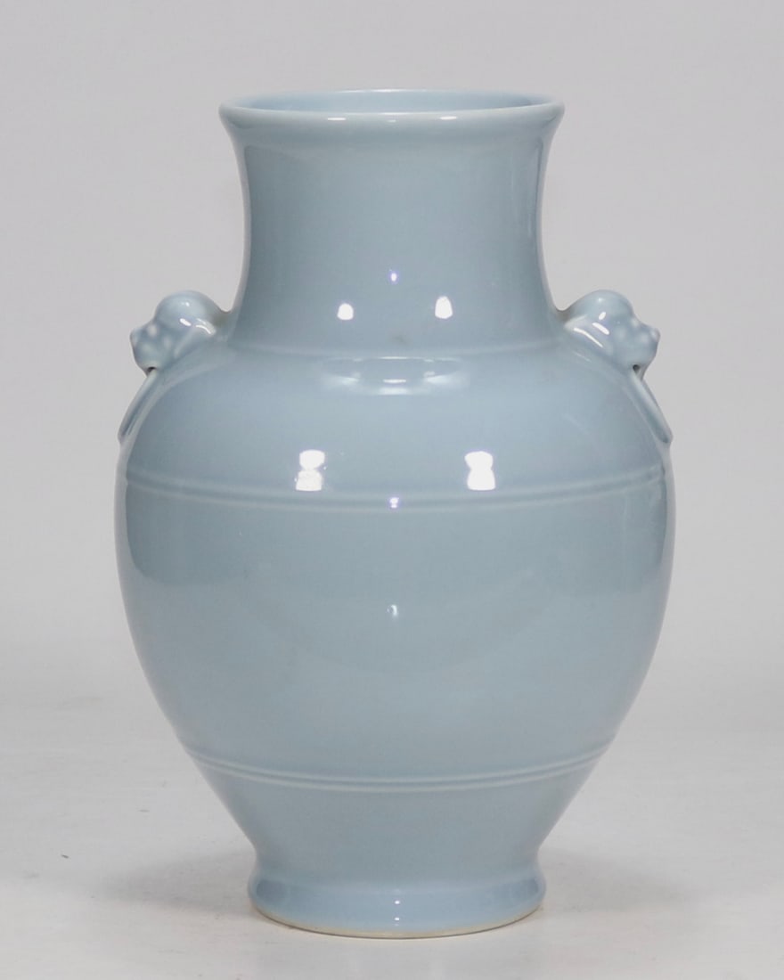 An Exquisite Sky Blue Glazed Double-Ears Vase: An Exquisite Sky Blue Glazed Double-Ears Vase Qing Dynasty, China Qianlong Four-character Mark Size:26cmx10.8cm (The Dimensions Of All Batches Are Manually Measured.If You Need More Detailed Informati