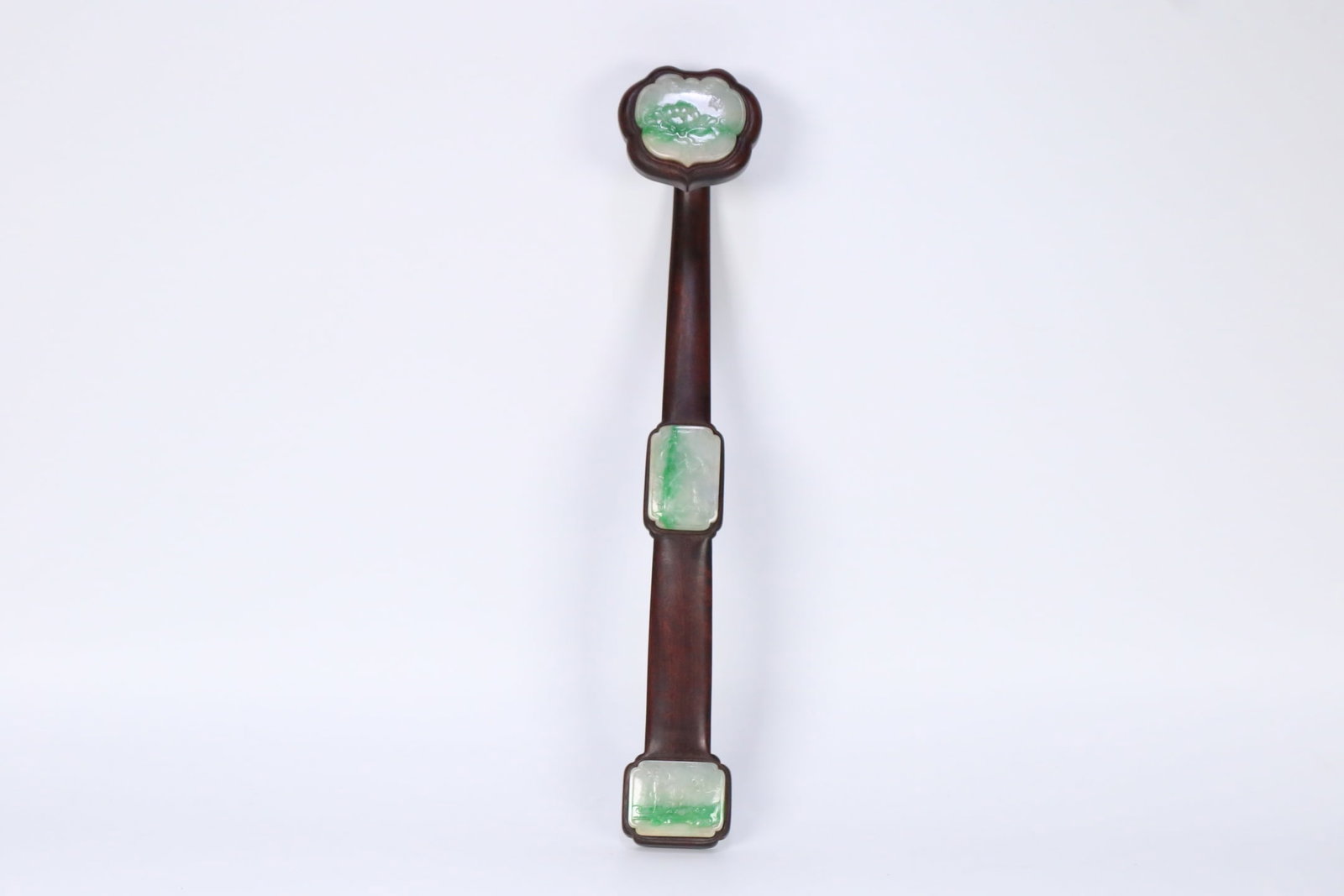 An Exquisite Zitanwood Inlaid Jadeite Flower and Bird Pattern Ruyi Ornament: An Exquisite Zitanwood Inlaid Jadeite Flower and Bird Pattern Ruyi Ornament Qing Dynasty, China Size:32.5cmx6cmx6cm Weight:171.2g (The Dimensions Of All Batches Are Manually Measured.If You Need More 