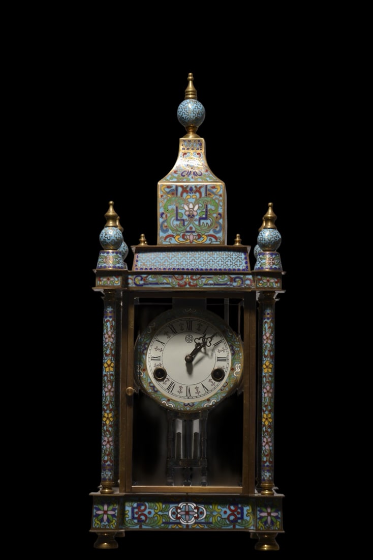 An Exquisite Bronze Lotus Pattern Clock: An Exquisite Bronze Lotus Pattern Clock Qing Dynasty, China Size:56cmx22cm (The Dimensions Of All Batches Are Manually Measured.If You Need More Detailed Information, Please Contact Our Customer Servi