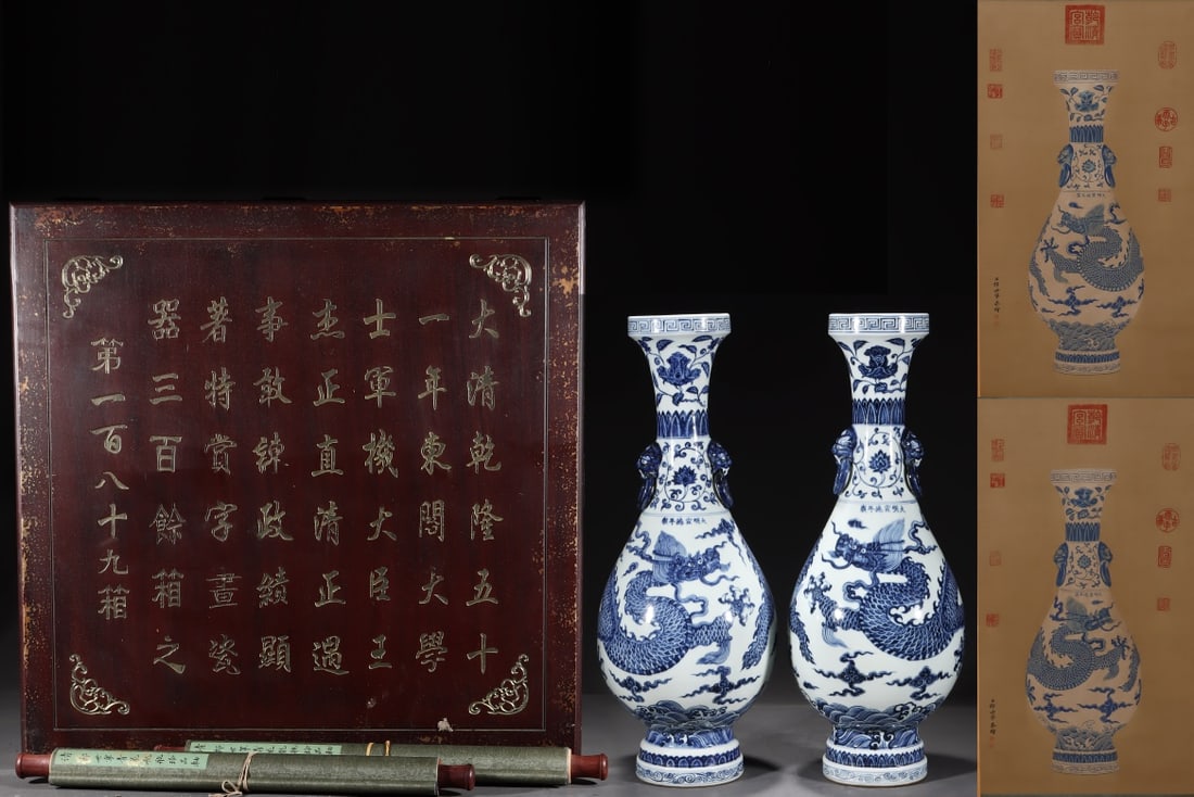 An Exquisite Blue and White Dragon Pattern Seawater Pattern Lotus Pattern Double-Ears Vase: An Exquisite Blue and White Dragon Pattern Seawater Pattern Lotus Pattern Double-Ears Vase Ming Dynasty, China Xuande Six-character Mark Size:56.3cmx21.3cm Without frame Size:79.5cmx43cm (The Dimensio