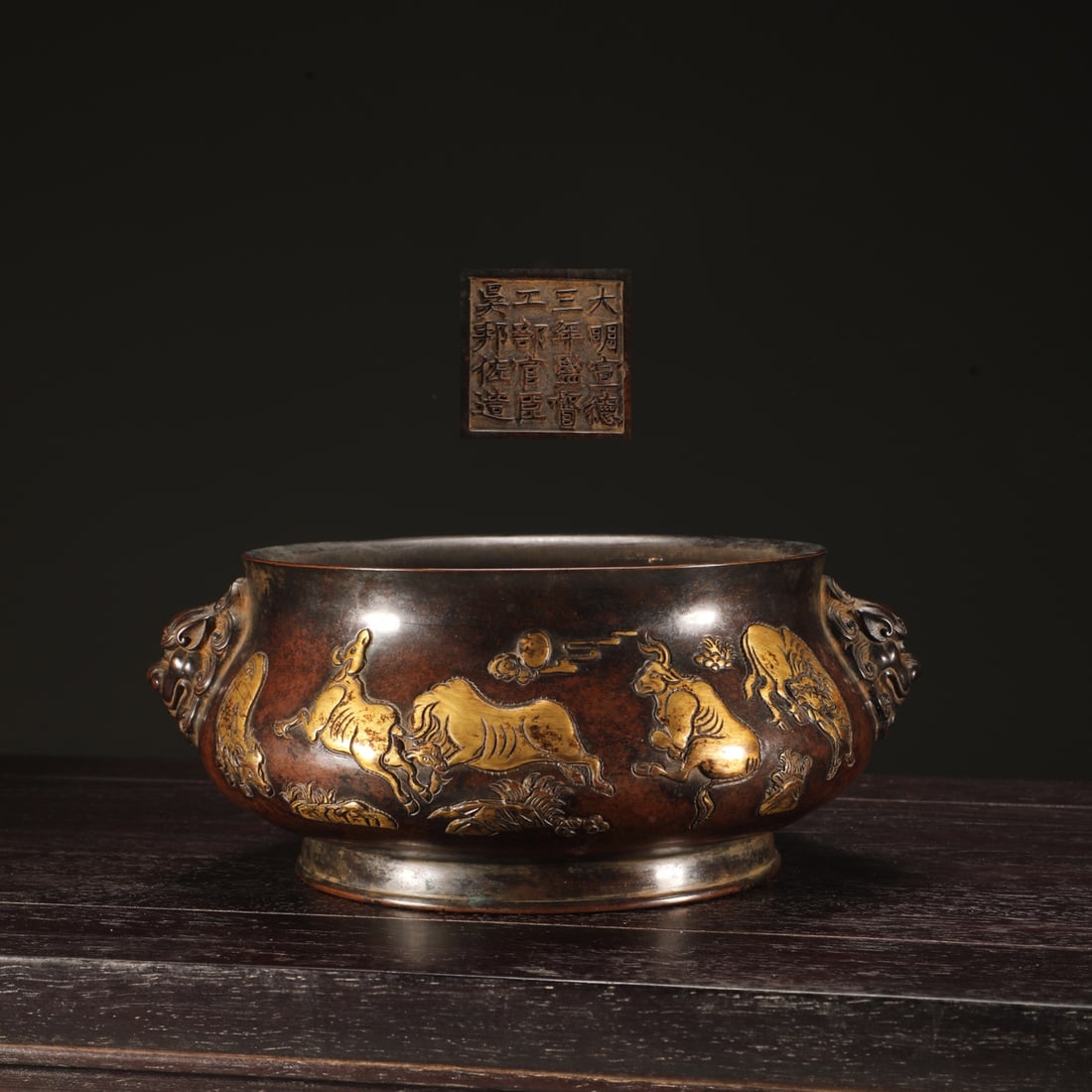 An Exquisite Gilt Bronze Buffalo Pattern Double-Ears Censer: An Exquisite Gilt Bronze Buffalo Pattern Double-Ears Censer Ming Dynasty, China Size:9cmx19.3cm Weight:3.5kg (The Dimensions Of All Batches Are Manually Measured.If You Need More Detailed Information,