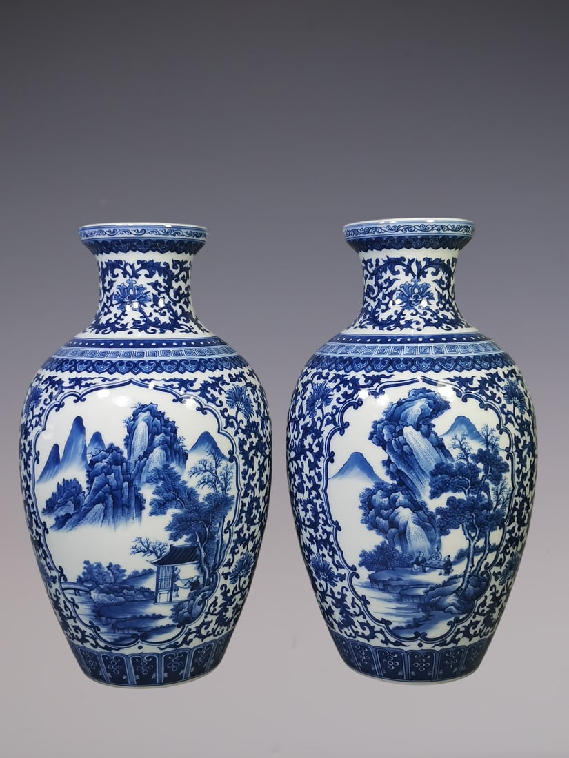 An Exquisite Blue and White Lotus Pattern Landscape and Figure Pattern Vase: An Exquisite Blue and White Lotus Pattern Landscape and Figure Pattern Vase Qing Dynasty, China Yongzheng Six-character Mark Size:34.8cmx19cm (The Dimensions Of All Batches Are Manually Measured.If Yo