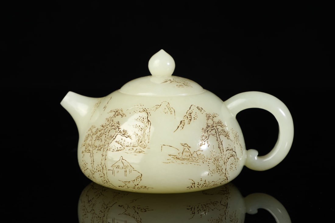 An Exquisite White Jade Landscape and Figure Pattern with poem Teapot: An Exquisite White Jade Landscape and Figure Pattern with poem Teapot Qing Dynasty, China Size:7cmx12cm Weight:277g (The Dimensions Of All Batches Are Manually Measured.If You Need More Detailed Infor