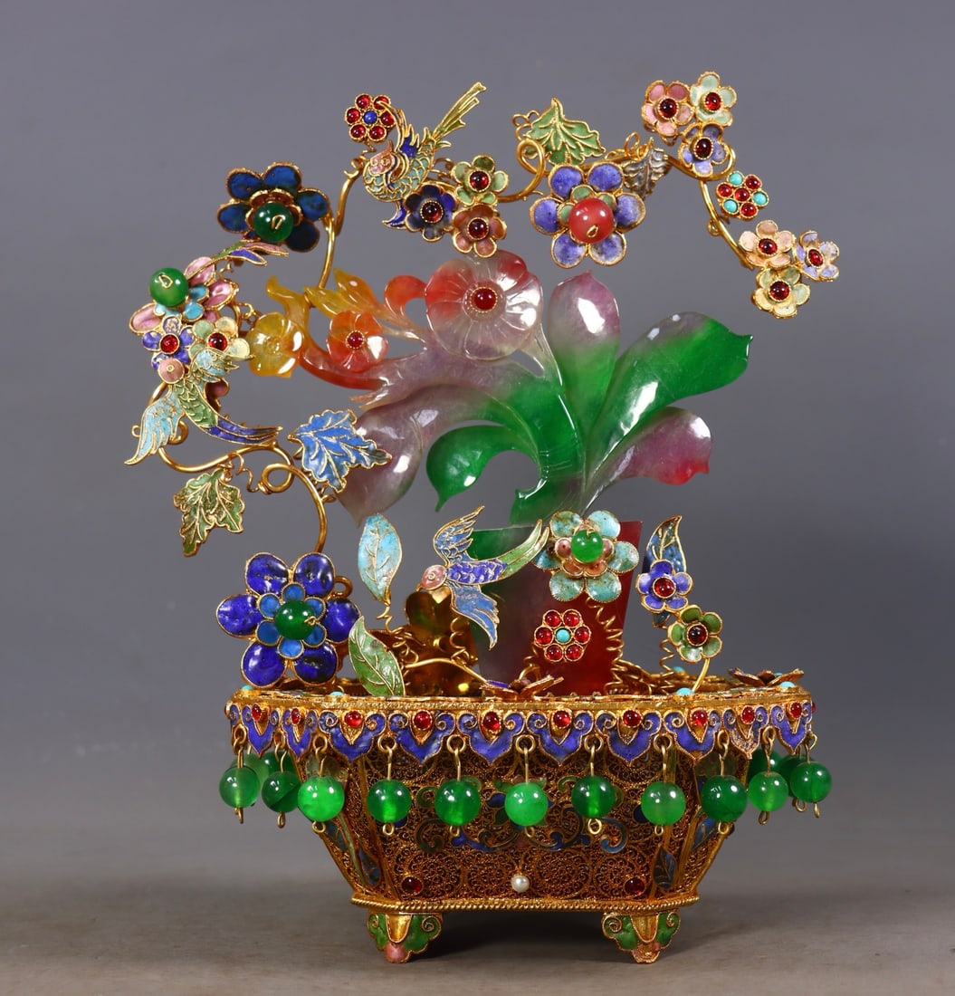 An Exquisite Gilt Bronze Inlaid Jadeite Flower and Bird Pattern Bonsai: An Exquisite Gilt Bronze Inlaid Jadeite Flower and Bird Pattern Bonsai Qing Dynasty, China Qianlong Four-character Mark Size:25cmx20cmx11cm Weight:847g (The Dimensions Of All Batches Are Manually Meas