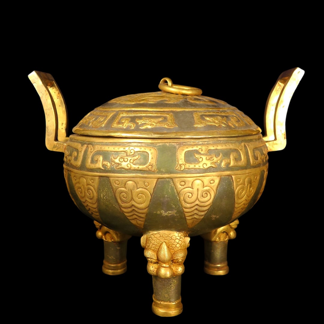 An Exquisite Gilt Bronze Beast-Face Pattern Double-Ears and Tripod Censer: An Exquisite Gilt Bronze Beast-Face Pattern Double-Ears and Tripod Censer Qing Dynasty, China Size:21cmx23cm Weight:1375g (The Dimensions Of All Batches Are Manually Measured.If You Need More Detailed